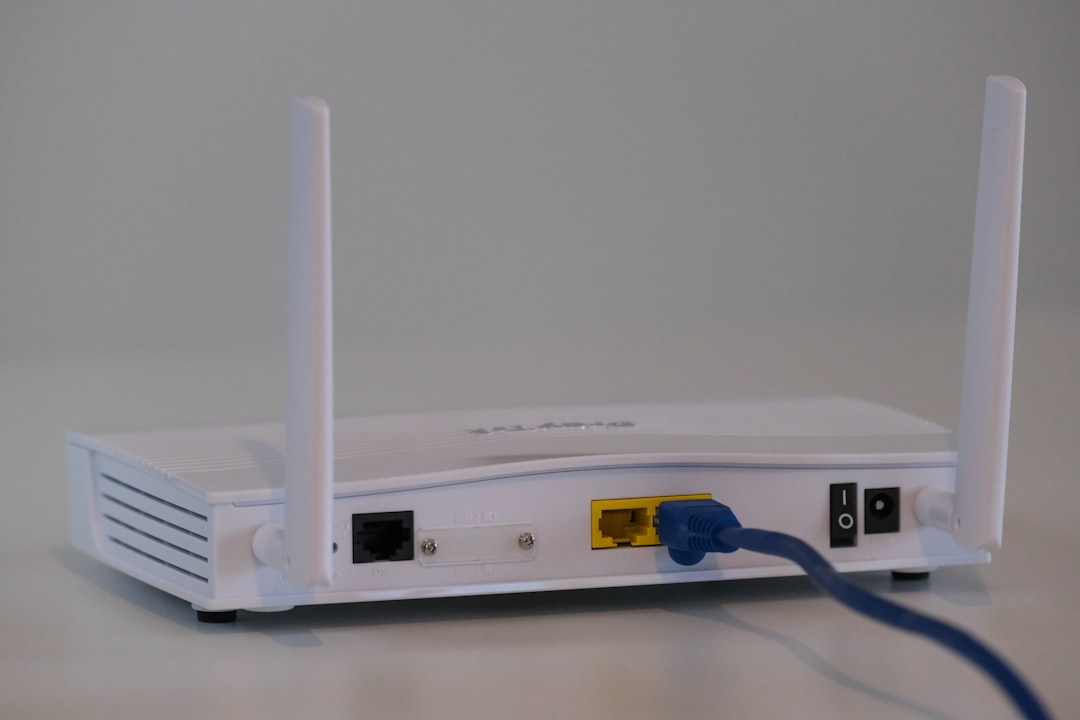 Broadband router with ethernet cable plugged in — restart your router to fix YouTube TV connection issues